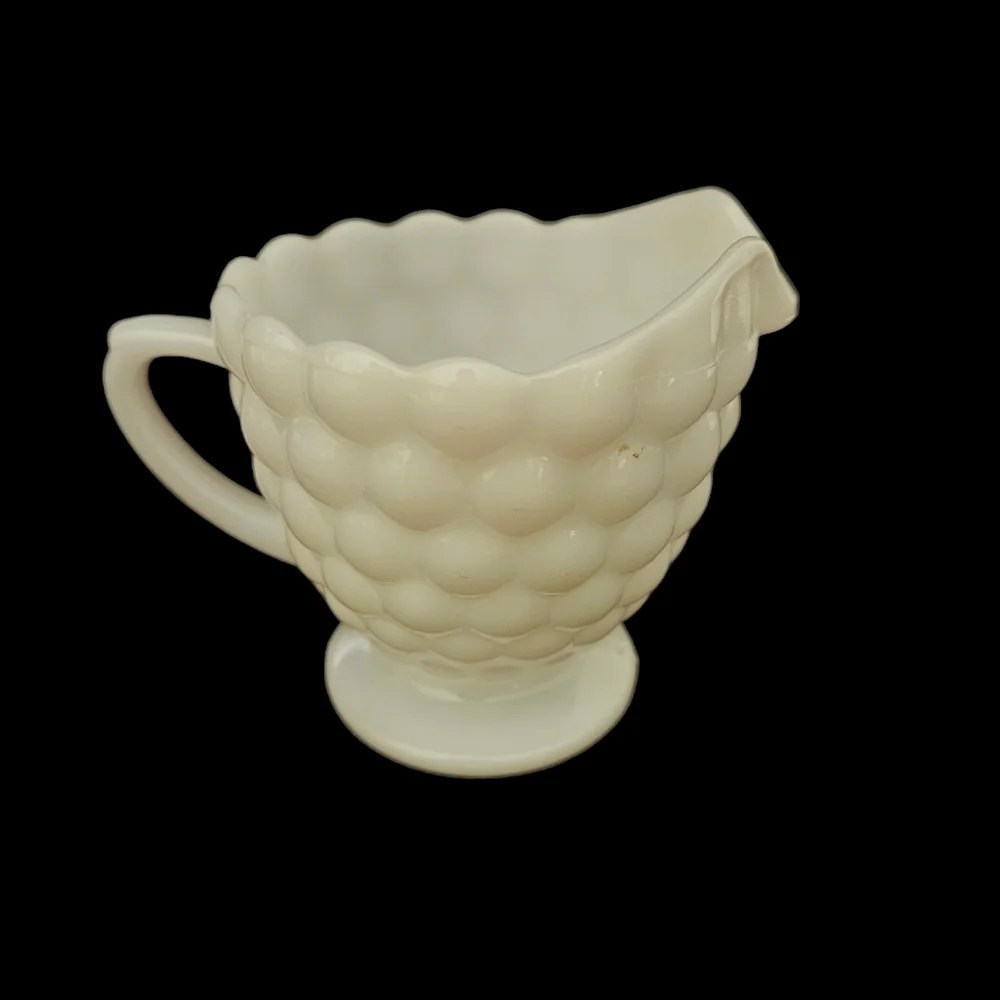 Vintage milk glass bubble creamer.